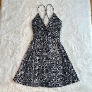 Express snake skin cross strap mini dress